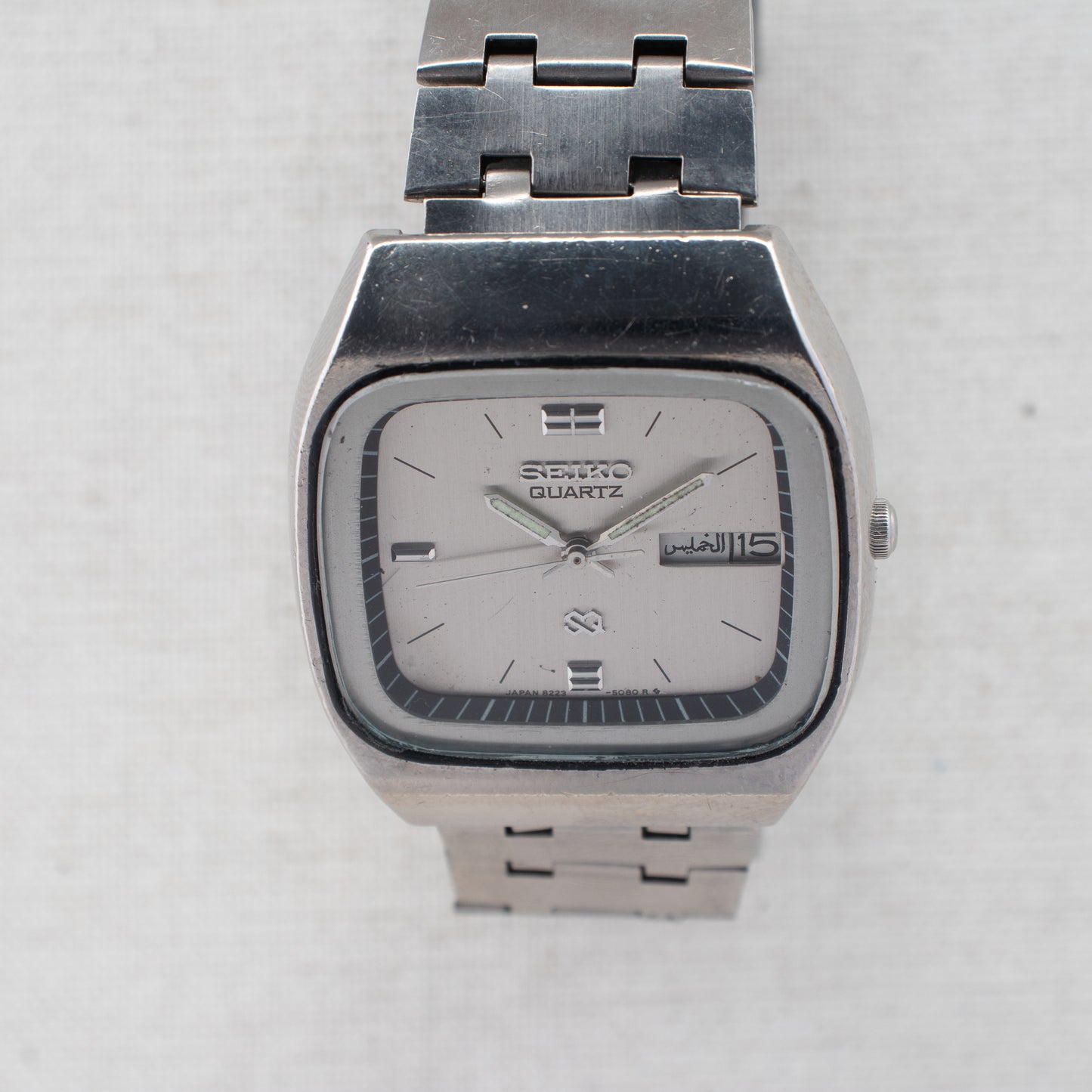 Vintage Seiko SQ Quartz Men's Watch 8223-5080 Silver Dial Arabic English Day 1989