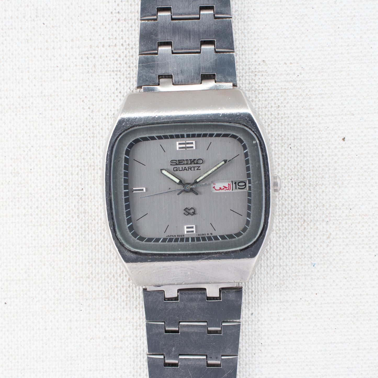 Vintage Seiko SQ Quartz Men's Watch 8223-5080 Silver Dial Arabic English Day 1989