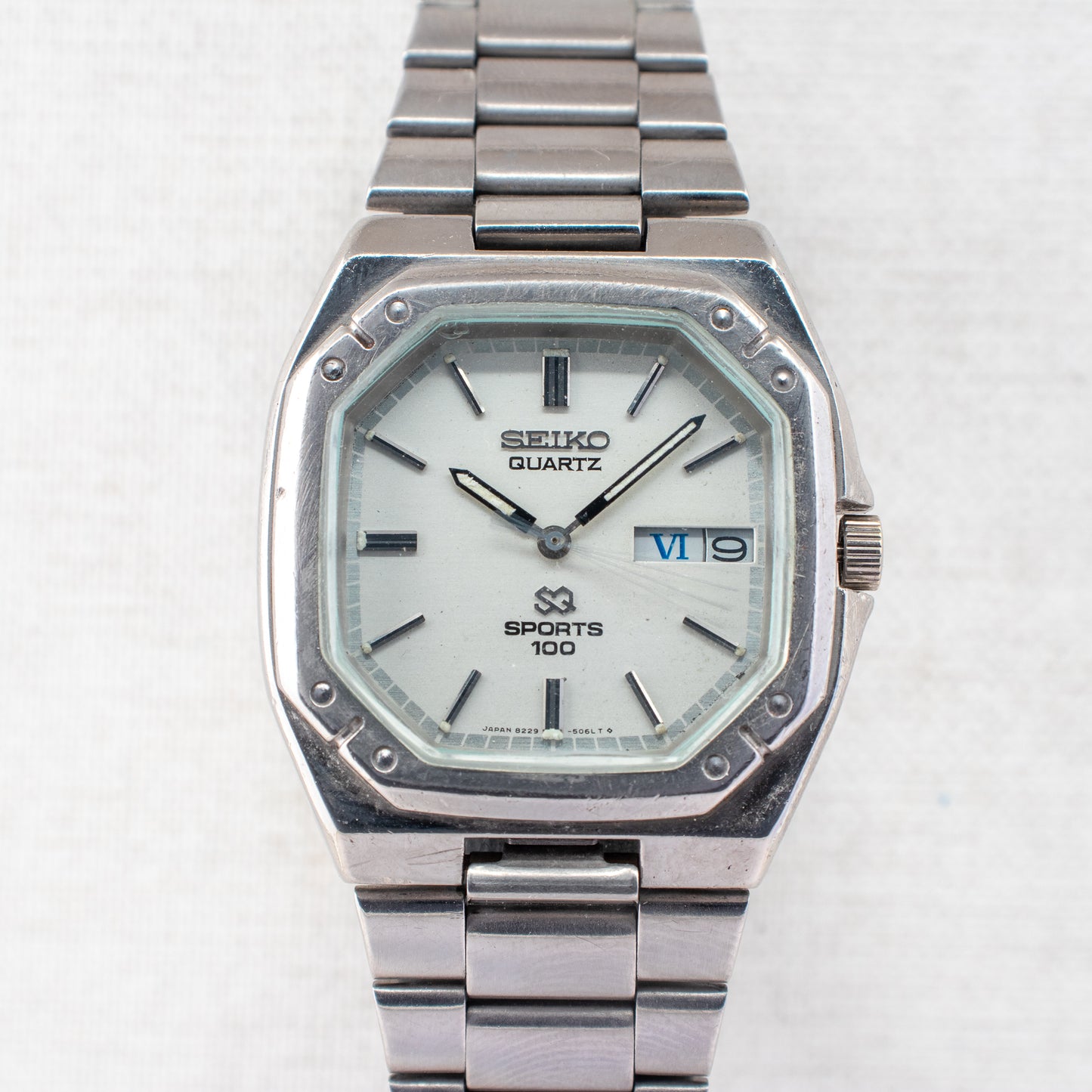 Vintage Seiko SQ Sports 100 Quartz 8229-5030 White Dial Octagonal Bezel Watch