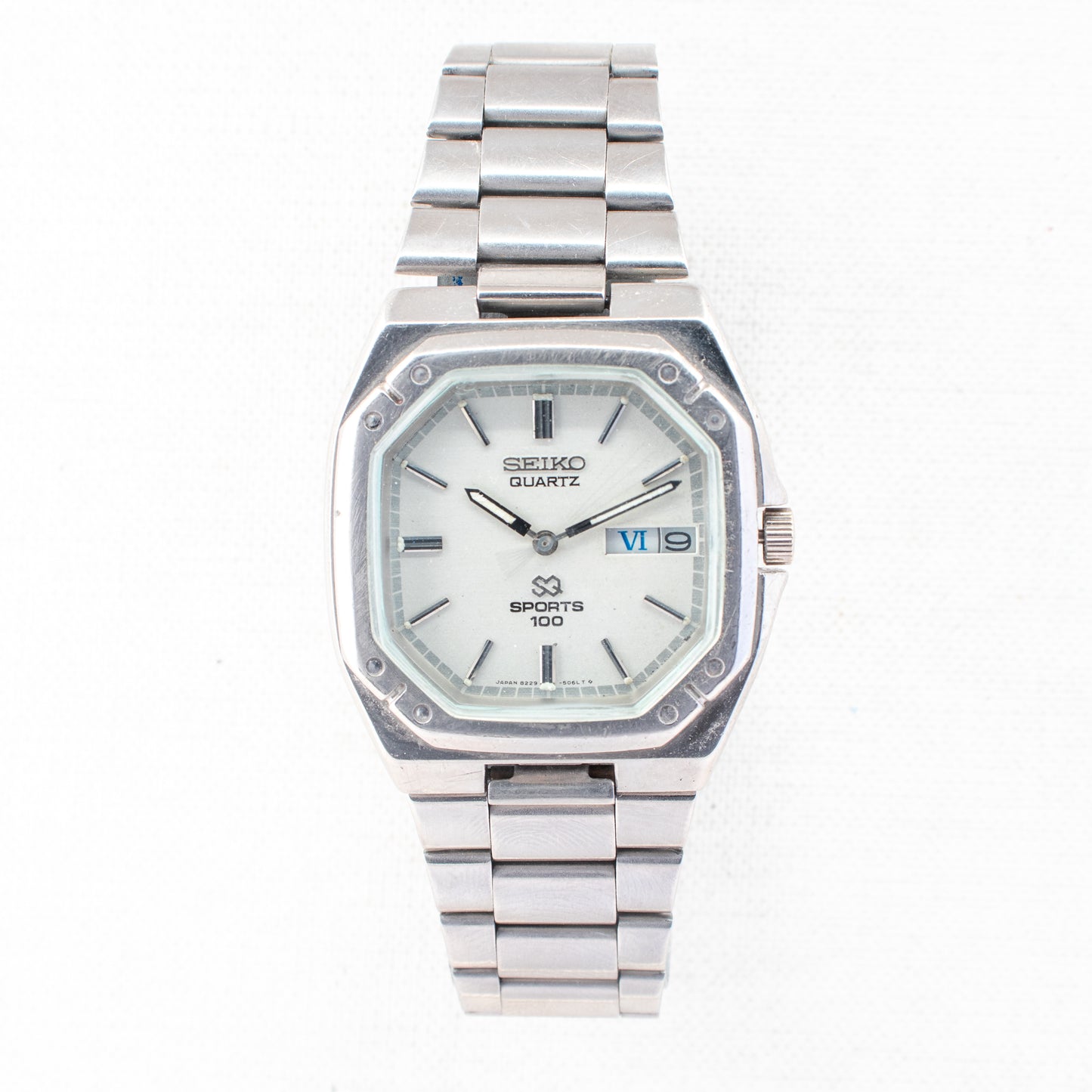 Vintage Seiko SQ Sports 100 Quartz 8229-5030 White Dial Octagonal Bezel Watch